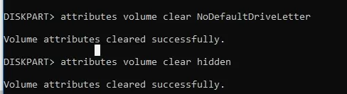 clear volume attributes NoDefaultDriveLetter and hidden